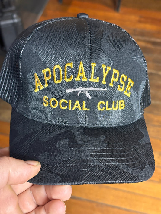 Apocalypse Social Club Golden Embroidered Dark Night Camo Trucker Cap